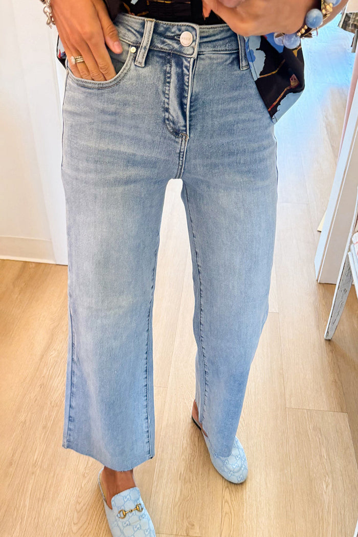 Light Wash Raw Hem Wide Leg Jeans